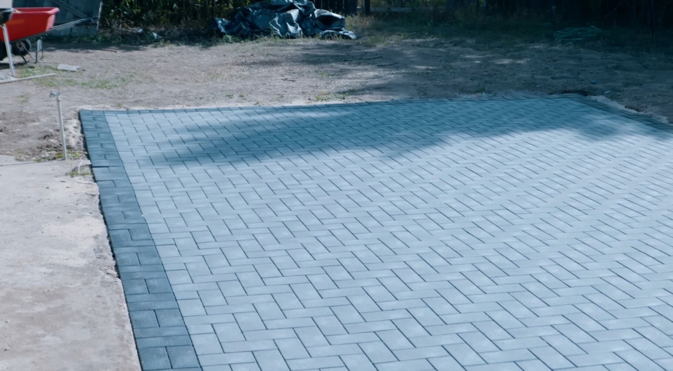 Freshly installed stamped concrete driveway at a residential home in Little Rock, AR